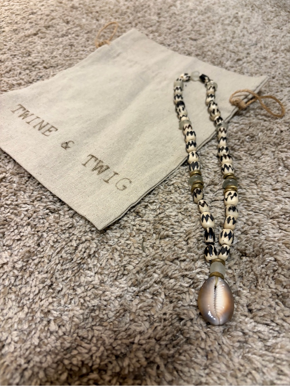 Twine & Twig Cream and Black Beaded Shell Pendant Necklace